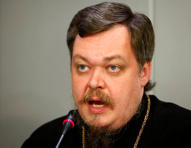 Russian Orthodox Church spokesman the Rev. Vsevolod Chaplin speaks at a news conference on proposed legislation to curb abortion rates in Russia, in Moscow, on May 30. Chaplin called on authorities Wednesday to investigate and ban novels by Vladimir Nabokov and Gabriel Garcia Marquez for "justifying pedophilia," keeping up his church's controversial steps to impose religious norms in a country that once rejected religion altogether. (The Associated Press/File)