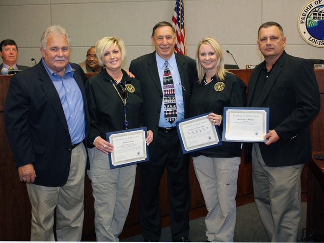 Shown from left are: Parish Council Chairman Pat Bell, Crystal Moran, Parish President Tommy Martinez, Rachael Wilkinson and Rick Webre.