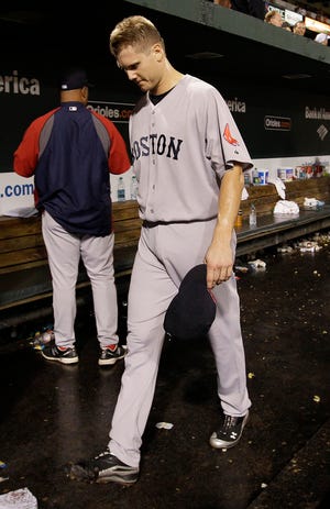 Boston Red Sox relief pitcher Jonathan Papelbon walks out of the dugout after the Red Sox's 4-3 to the Orioles in Wednesday's game in Baltimore.