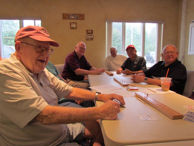 From left, clockwise, Abington resident Red Greenleaf leads the Senior Center’s Cribbage club this week on Tuesday with Abington resident Richard McCollem, Rockland resident Jerry Duncan, Abington resident and Rockland native Neil Caldeira and Whitman resident Ronnie Stundze. The regional club gets together three times a week to play some heated matches.
