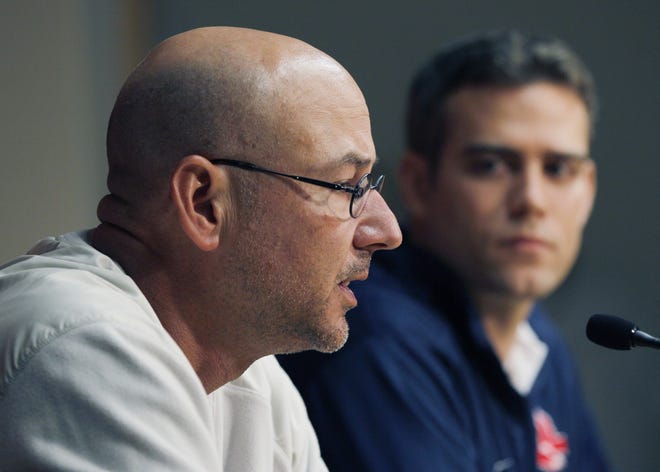 Boston Red Sox manager Terry Francona, left, speaks as general manager Theo Epstein listens during a news conference at Fenway Park in Boston, Thursday, Sept. 29, 2011, one day after the Red Sox failed to make the playoffs. Epstein said he won't make a scapegoat of Francona after the team's unprecedented September collapse.