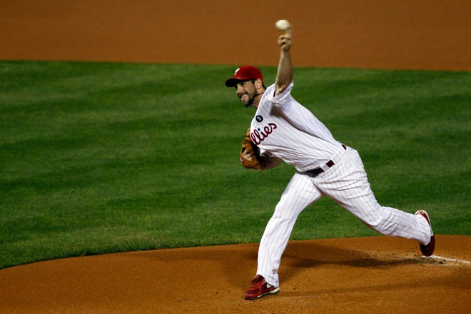 AP Photo/Mel Evans 
Philadelphia Phillies starting pitcher Cliff Lee throws a pitch during the first inning of Game 2 of the National League division series with the St. Louis Cardinals Sunday in Philadelphia.