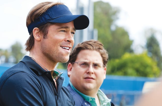 Left, Brad Pitt plays Oakland Athletics’ General Manager Billy Beane as he tries to save the team along with Peter Brand (Jonah Hill, right) in the movie "Moneyball."
