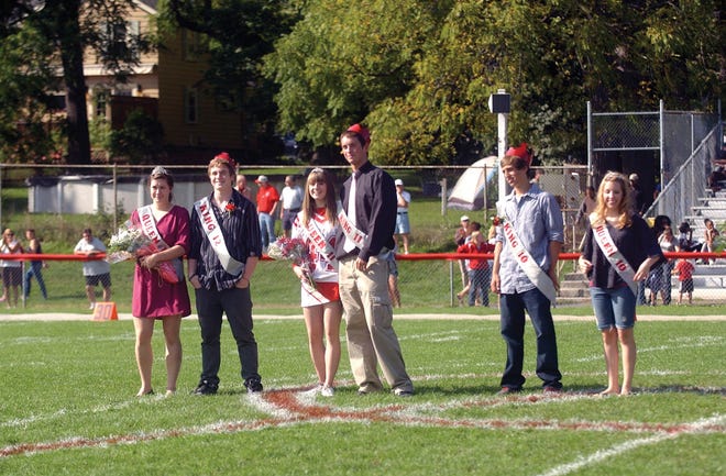 The Canandaigua homecoming kings and queens are presented to the crowd.