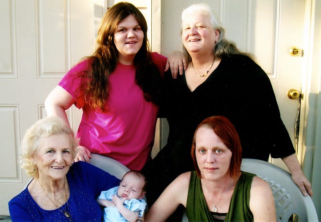 Sitting from left: Great-great-grandmother Jacqueline Blank holding baby Jeremiah and grandmother Melissa De Long. In back: mother Savannah Sixta and great-grandmother Deborah Theerman