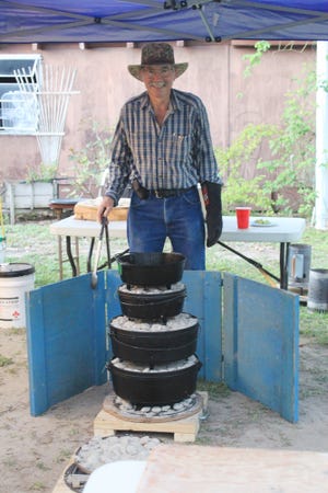 Ed Braud showcases his stacked pot Dutch Oven cooking technique.
