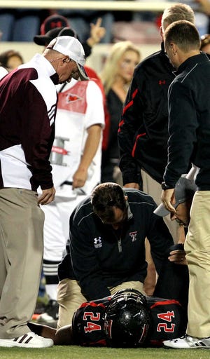 Texas Tech running back Eric Stephens is tended to after suffering a knee injury late in the Red Raiders' 45-40 loss to Texas A&M on Saturday at Jones AT&T Stadium. Tech was awaits MRI results for Stephens, but head coach Tommy Tuberville said Monday that Stephens' prospects don't look good.