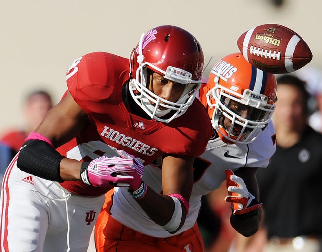 Indiana wide receiver Duwyce Wilson (81) can't make the catch with pressure from Illinois defensive back Supo Sanni during an NCAA college football game at Memorial Stadium in Bloomington, Ind., Saturday, Oct. 8, 2011. Illinois won 41-20. (AP Photo/The Herald-Times, Chris Howell)
