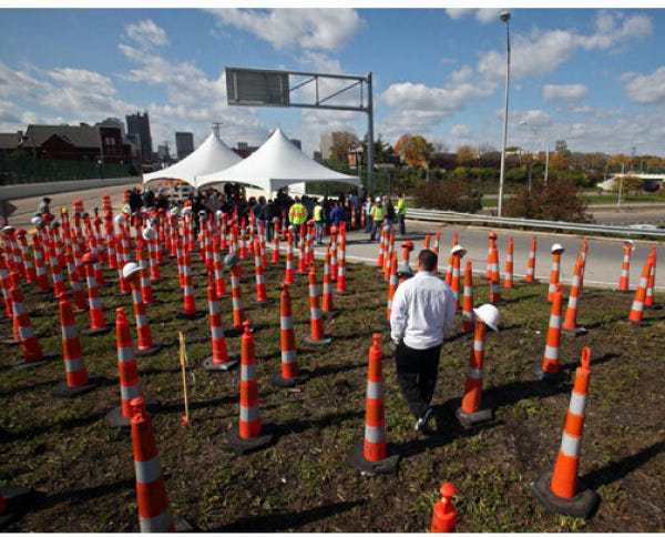 Transportation officials set up 300 orange cones to represent the number of workers on the I-71/670 rebuild project at its peak.