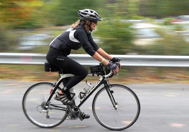 Kathy Brugh of York pulls into Minisink Athletic Fields in Smithfield Township on Saturday following the 107-mile-long Black Bear Century bicycle ride.