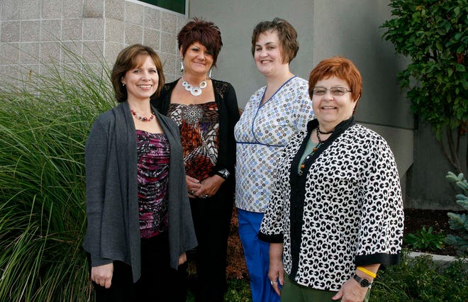 Shelley Cotosman (from left) Dawn Cacioppi, Lisa Bruno and Carol Gordon are breast cancer survivors. They were photographed Wednesday, Oct. 12, 2011.