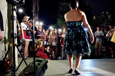 Randi Zuckerberg, back to camera, sang at a party in Palo Alto, Calif., in September.