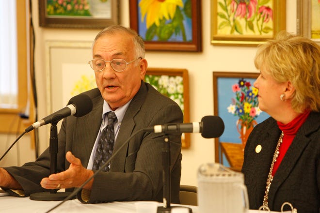 Mayoral candidate Ron Matta and Mayor Linda Balzotti engage in a debate at the Mary Cruise Kennedy Senior Center in Brockton on Wednesday, Oct. 19, 2011.