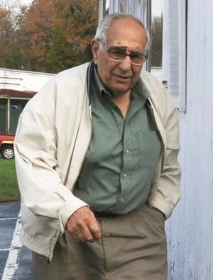 Armen Amerigian of West Bridgewater returns to his Day’s Gone By antique business after pursuing a man who robbed him at gunpoint.