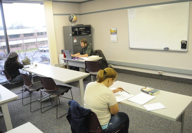 The adult learning center at Michigan Works opened up new space at its building on Clover. Students use the area as they take a test in a GED class.