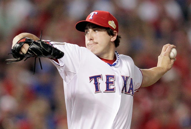 Rangers starter Derek Holland gave up only two hits in 81/3 innings during Sunday night’s 4-0 victory over the Cardinals in Game 4 of the World Series. Game 5 is Monday night in Arlington, Texas, with St. Louis starter Chris Carpenter facing Texas’ C.J. Wilson.