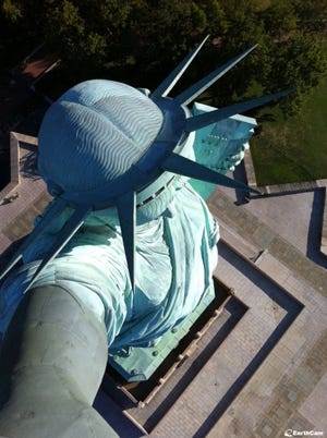 This photo shows the Statue of Liberty from a camera mounted in its torch. Five torch cams will be switched on Friday and remain on 24 hours, 7 days a week. The cameras were donated to the National Park Service by Earthcam Inc. of New Jersey.