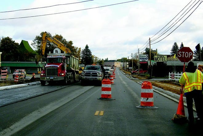M-68 in Onaway gets a fresh layer of asphalt Monday, taking one step closer to     completing a $4.3  million project that is upgrading the city’s water and sewer lines as well as the road for a 1.34 mile stretch.