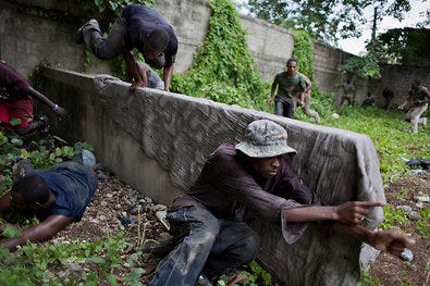 The Organization of Demobilized Soldiers for the Reconstruction of Haiti trains weekly on the outskirts of Port-au-Prince.