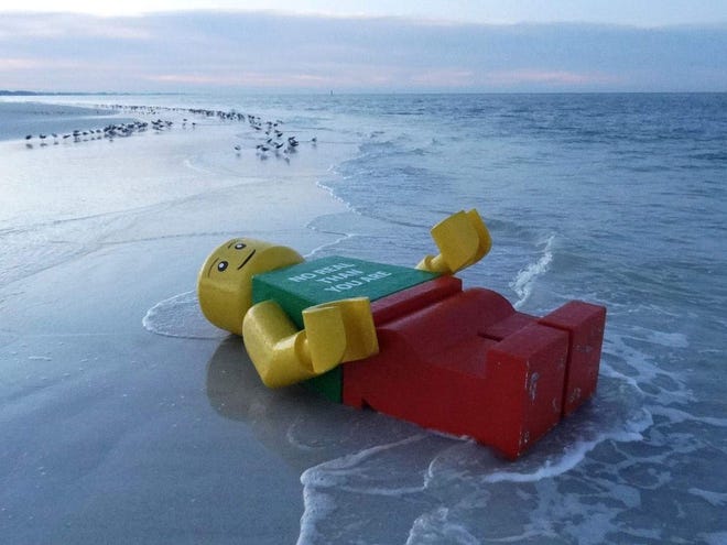 This 8-foot-tall Lego man washed up overnight on Siesta Key beach in Sarasota. (Photo provided by Jeff Hindman; Oct. 25, 2011)