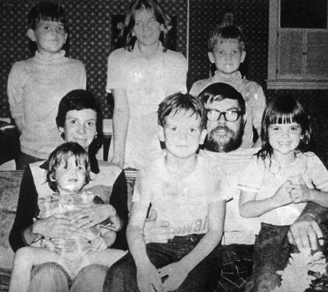 Six children of Simon Peter and Ann Nelson were found slain in this Rockford home on the morning of Jan. 7, 1978. In the family photo, seated with Nelson and his wife Ann, are David (from left), 3; Matthew, 7; and Roseann, 6. Standing are Andrew, 8; Jenny, 12; and Simon Peter III, 10. Nelson was convicted of killing the children and is in prison.