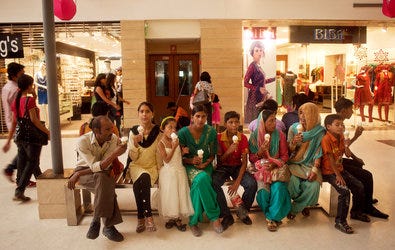 A family ate ice cream at a shopping mall in New Delhi.