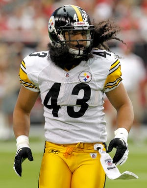 Pittsburgh Steelers strong safety Troy Polamalu walks to the sidelines during last Sunday'sl game in Glendale, Ariz.