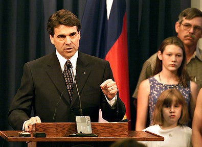 REJECTING AN EXECUTION BAN | Gov. Rick Perry in 2001, announcing his veto of a bill that would have banned the execution of mentally retarded death row inmates. A Supreme Court decision later instituted the ban.