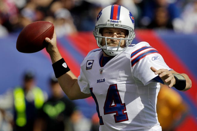 Buffalo Bills quarterback Ryan Fitzpatrick (14) looks to pass during the first quarter of an NFL football game against the New York Giants Sunday, Oct. 16, 2011, in East Rutherford, N.J.