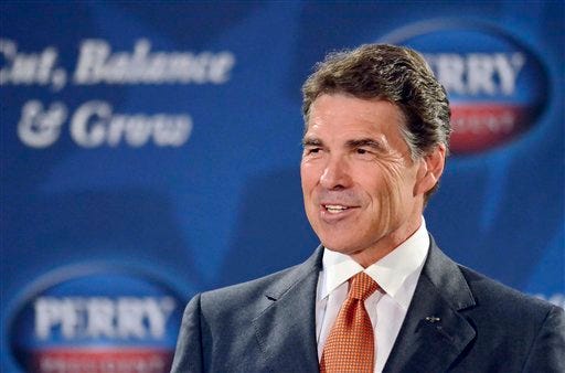 In this Oct. 25, 2011 file photo, Republican Presidential candidate, Texas Gov. Rick Perry speaks in Gray Court, S.C. Twitter is abuzz with presidential candidates this year, though not all in the Twittersphere are equal.