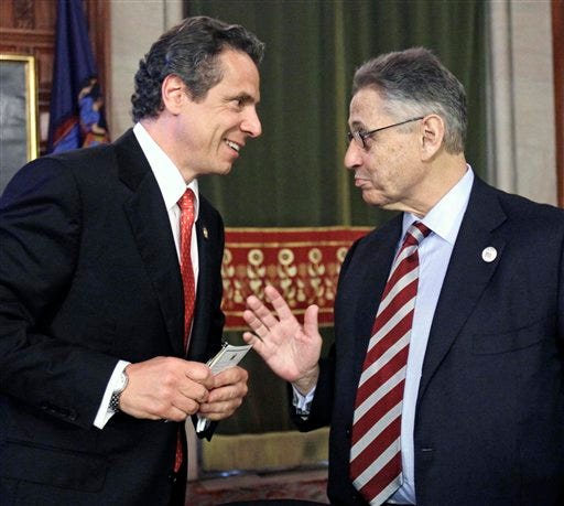 New York Gov. Andrew Cuomo, left, talks with Assembly Speaker Sheldon Silver, D-Manhattan, in Albany, N.Y., on Tuesday, May 24. Silver says his support of a property tax cap is "inextricably linked" to expanding and renewing rent control regulation in New York City.
