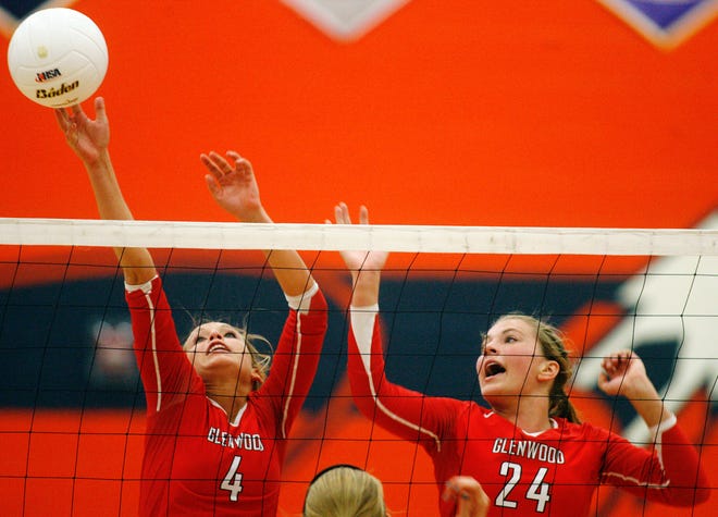 Glenwood’s Courtney Rayhill, left, can’t get to the ball as Taylor Copp looks on against Normal University High School.