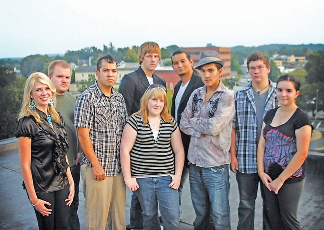 Cast photo taken atop the roof of the Christian Life Center overlooking downtown Leominster. Pictured (left to right, first row): Lizzie Burke, Lauren Kelly (in center), Haylee Piland; (second row): Chad Lough, Anderson DaSilva, Guigo Salles, Corey Hallinan; (third row): Roland Joey Lapointe, Billy Garcia.