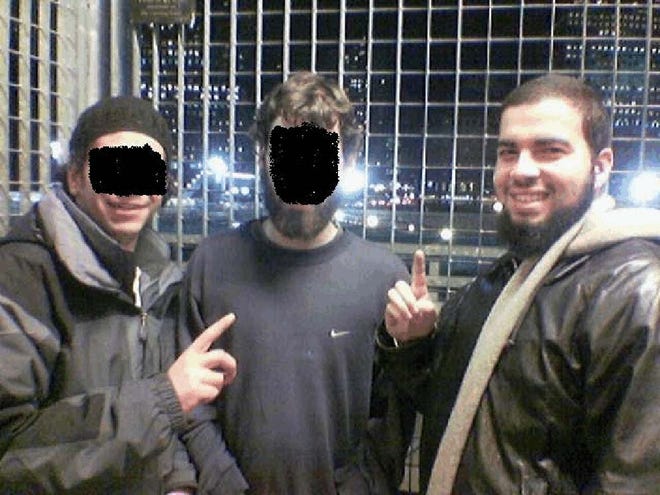 Documents in Tarek Mehanna's federal indictment included this photo of him smiling with friends at ground zero in New York City.