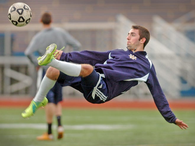 Aidan Browne, a sophomore striker on the Archbishop Williams High School boys soccer team, practices in Braintree, Thursday, Nov. 3, 2011. The team has qualified for postseason play.