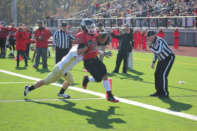 Bridgewater State's Chris Constantine scores a touchdown during the Bears' 38-35 victory over Massachusetts Maritime Academy on Saturday in the 33rd annual Cranberry Bowl.