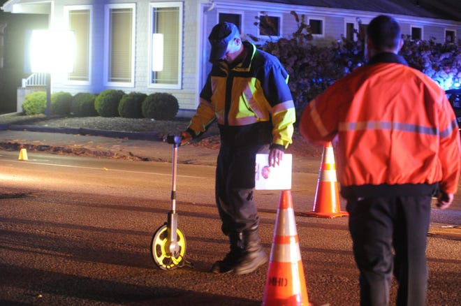 Massachusetts State Police reconstruct the pedestrian accident at 840 Belmont Street on Friday, November 04, 2011 in Brockton.