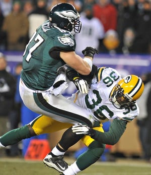Steve Gengler / Staff Photographer 
 Eagles tight end BrentCelek collides with Packers safety Nick
Collins during the Jan. 9 wild-card playoff loss to Green Bay.
Celek, who had 42 catches last season, has only nine so far this
year.