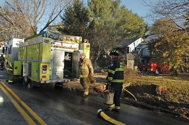 John Huff/Staff photographer 
Fire departments from Berwick and surrounding communities respond to a basement fire on Old Pine Hill Rd. Sunday morning.