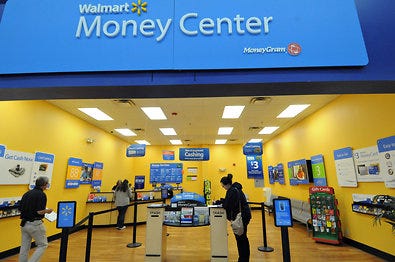 A Wal-Mart Money Center in Dickson City, Pa. The Money Center charges 1 percent to cash a check under $300, and $3 to cash a check from $300 to $1,000.