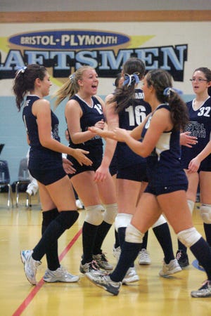 The Bristol-Plymouth volleyball team celebrates their win over Bristol-Aggie on Monday night.