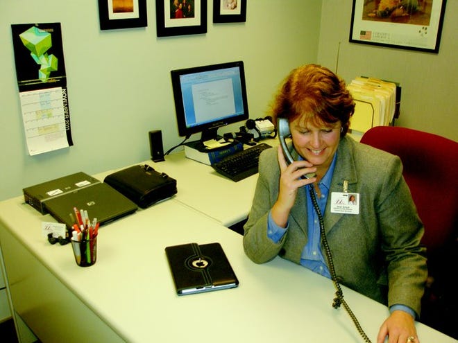 Shari Schult, the recently named interim Chief Executive Officer at Cheboygan Memorial Hospital, takes a call during her first week at the position.