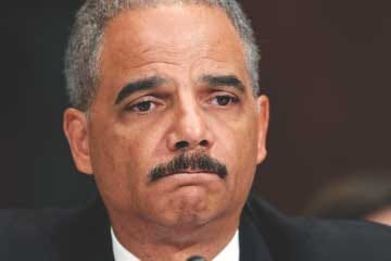 Attorney General Eric Holder testifies on Capitol Hill in
Washington on Tuesday before the Senate Judiciary Committee hearing
in the arms trafficking investigation called Operation Fast and
Furious.