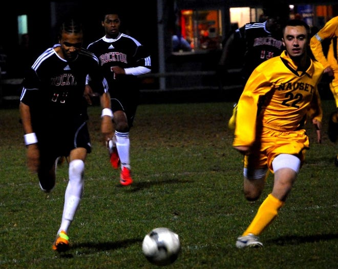 Brockton's Joel Lobo, left, and Nauset's Adam Huber battle for possession in the quarterfinals of the Division 1 South sectional soccer tournament in Nauset on Wednesday, Nov. 9, 2011. Nauset won, 2-0.