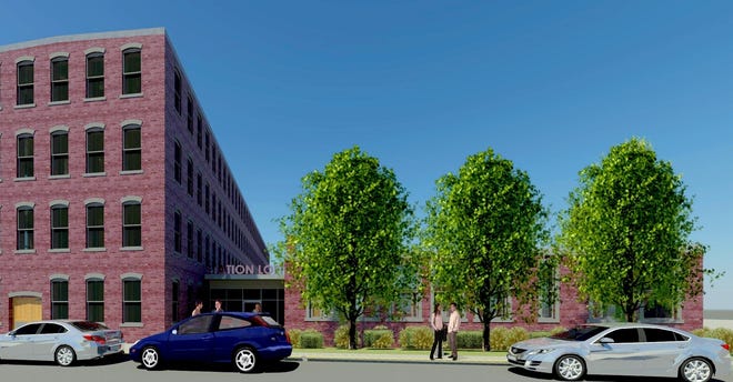 An artist rendering of how the old Knight Building at the corner of Lincoln and Montello streets in downtown Brockton would look once renovated into 25 loft-style apartments. The development project is called "Station Lofts."