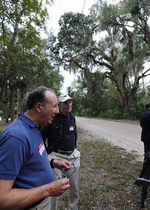 David Stair (left) and his brother Peter, descendants of the Kingsley family, attended the announcement Thursday of the discovery of six unmarked graves believed to be for slaves at Kingsley Plantation.