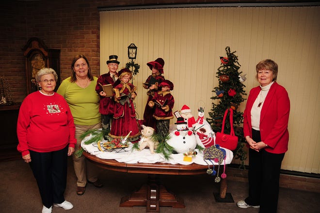 From left Mary Mowery, Mary-Jo Wiswedel, and Nancy Haggarty stand in front of a display of goods that will be for sale during the annual United Methodist Bazaar at United methodist Church. Dennis R.J. Geppert/Sentinel Staff
