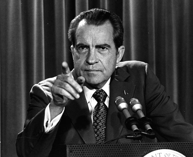 In this March 15, 1973, file photo President Nixon tells a White House news conference that he will not allow his legal counsel, John Dean, to testify on Capitol Hill in the Watergate investigation and challenged the Senate to test him in the Supreme Court. A feisty Nixon defended his shredded legacy and Watergate-era actions in grand jury testimony that he thought would never come out. On Thursday, Nov. 10, 2011, it did. (AP Photo/Charles Tasnadi, File)