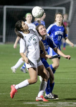 Canton's Steph Atocha and Scituate's Marissa Marshalka go up for a header in the second half of Wednesday's Division 2 South sectional quarterfinals against Scituate.Canton won, 6-0.