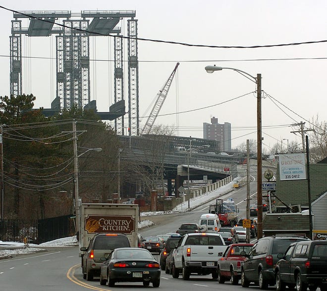 Traffic backs up at the Fore River Bridge.
